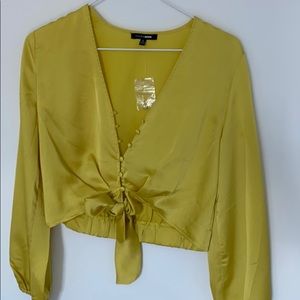 Silky blouse with knot and button details